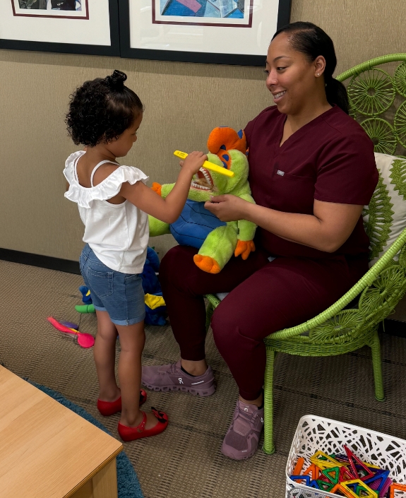 Two kids at dental office smiling